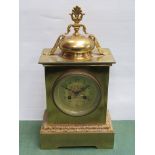 A brass mantel clock with acanthus detail, Arabic gilded dial, 8 day movement, keys and pendulum,