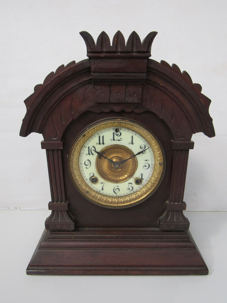 An early 20th Century American mahogany mantel clock with Arabic enamelled chapter ring,