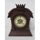 An early 20th Century American mahogany mantel clock with Arabic enamelled chapter ring,