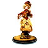 A 19th Century French automaton doll, 16" head stamped F1G, the girl fanning herself,