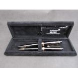 A cased Mont Blanc Meisterstuck No 146 fountain pen and biro set with paperwork