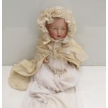 An Einco 2 German bisque headed girl doll, 13" tall,