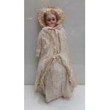 A 27" bisque head, composition limb girl doll, sleeping eyes in bonnet,