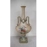 A late 19th Century Royal Worcester porcelain two - handled pedestal vase applied with marks to
