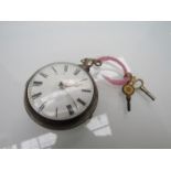 A late 18th/early 19th Century silver pair cased pocket watch with Roman enamelled dial,