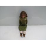 A 15" Armand Marseille girl doll in green silk dress