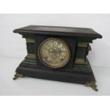 A late Victorian faux marble striking mantel clock with two treain movement,