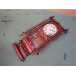 A late 19th/early 20th Century American drop dial wall clock with rosewood veneered/satin and ebony