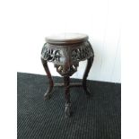 A 19th Century Chinese hardwood occasional table with rose marble top,