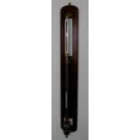 A brass cased Fortin barometer by Negretti & Zambra, mounted on a mahogany back board, long range,