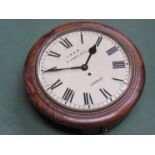 An oak dial clock with Roman dial signed LNER R.