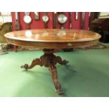 An early Victorian mahogany pedestal tip-top circular dining table,
