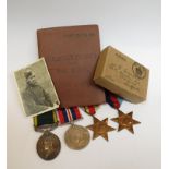 A George VI Territorial Force Efficiency medal 1939-45 and Africa Stars and War medal to 761409 GNR.