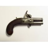 A late 19th Century percussion turnover pistol by T.Wilson & Co.