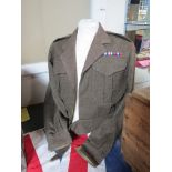 A WWII British Battledress blouse dated 1943,