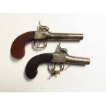 Two 19th Century percussion boxlock pistols, both with chased foliate design.