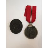 A replica German wound badge and a replica Eastern Front medal (2)