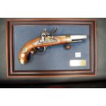 A replica display of a Napoleonic flintlock pistol