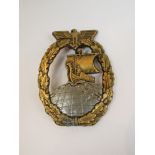 A German design Kriegsmarine Auxiliary Cruiser badge,