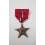 A WWII US bronze star medal in issue box