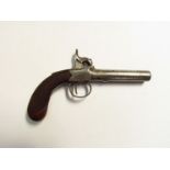 A 19th Century percussion boxlock pistol with chased foliate engraving, crosshatch grip.