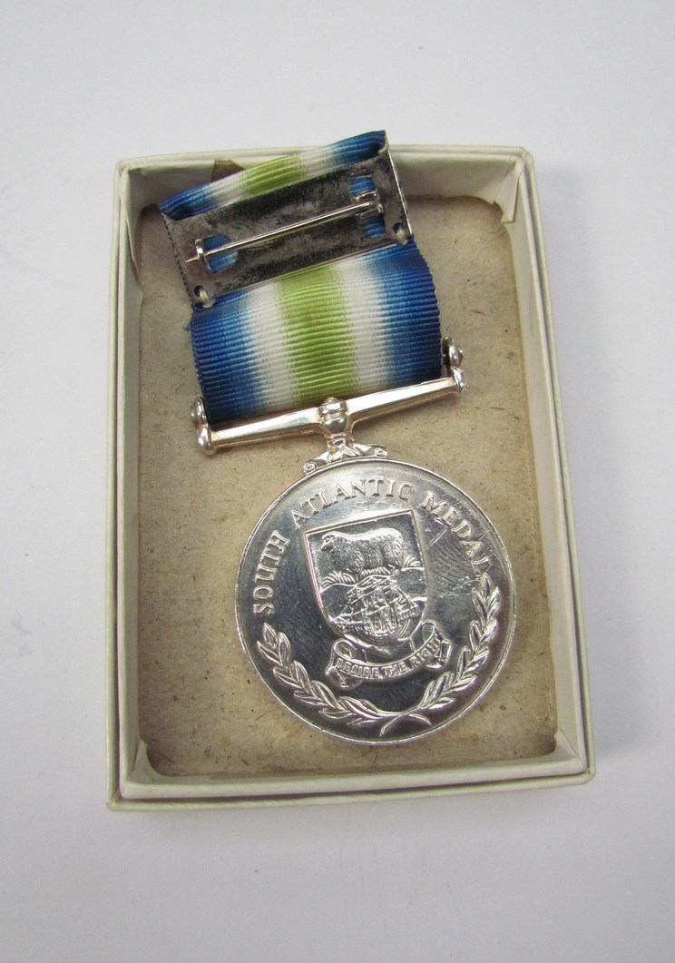A South Atlantic medal bearing name D186362M D.J. BLAND MEM(M) HMS HERMES. Sold as seen.