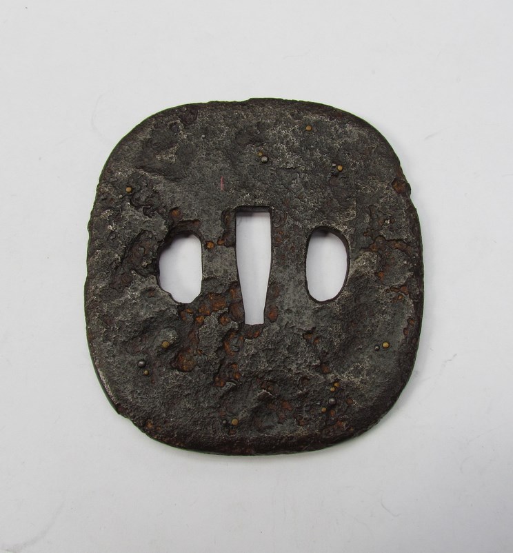 A circa 1750 Japanese hammered iron sword guard (tsuba) of large proportions. - Image 2 of 2