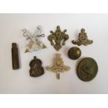 A quantity of military badges including relic German wound badge and silver ARP badge