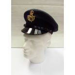 An RAF Warrant Officer's peaked hat by Hobson and Sons, London,