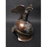 A Prussian Gardes du Corps officers helmet, of copper body with silver rim and band,