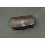 A Victorian leather ammunition pouch with embossed "1st LRV 1891",