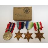 Four WWII medals and ribbons including Italy,