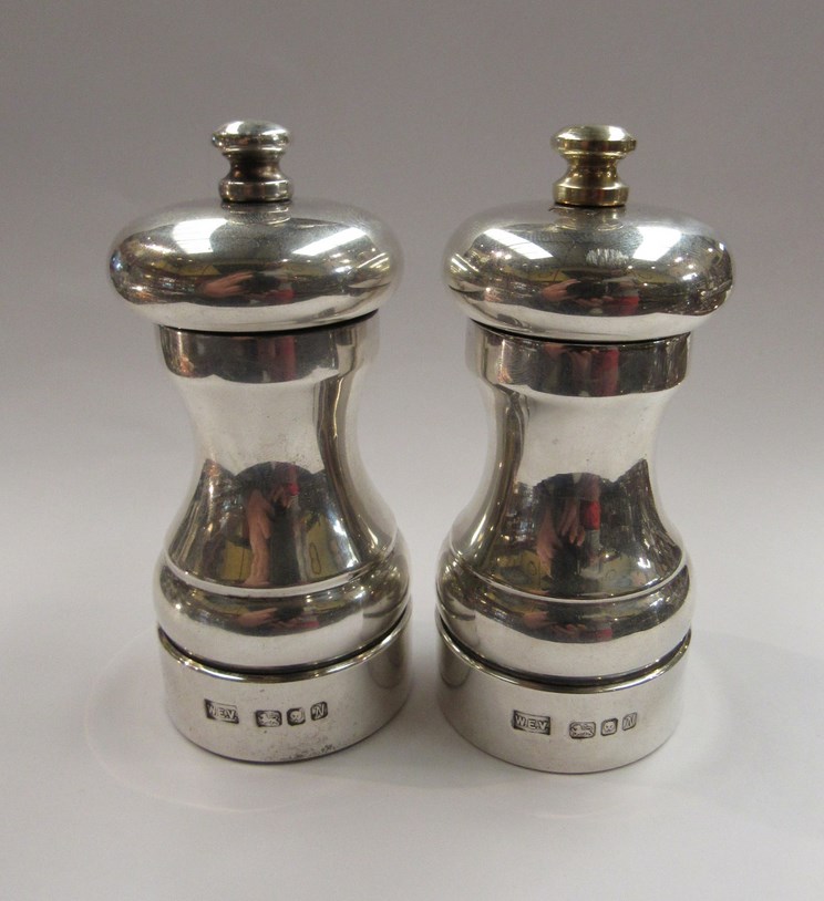 A silver pepper mill and salt mill 'Peter Piper' maker's mark W.E.