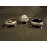 A Josiah Williams silver three piece cruet comprising two salts and a mustard, Exeter 1857,