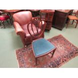 A pair of Victorian mahogany dining chairs, crown and feathered back support,