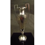 A William Hutton and Sons Ltd silver twin handled stem vase, with ribbon and floral swag detail,