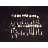 A quantity of silver teaspoons, tongs etc, various makers and dates,