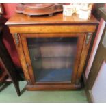 A late Victorian walnut pier cabinet,