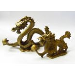 A pair of Oriental brass dragons