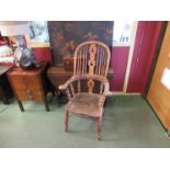 A 19th Century Windsor armchair with elm seat