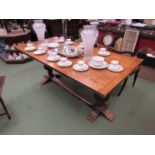 A 19th Century oak refectory dining table with carved bulbous supports and stretcher base,