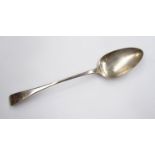 A Christopher & Thomas Wilkes Barker silver serving spoon, crested handle, London 1803,