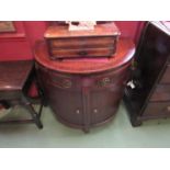 A 19th Century inlaid mahogany tambour/bow-front side cabinet with three drawers