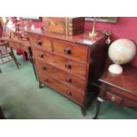 A Victorian mahogany chest of two over three drawers on outswept front feet