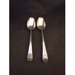 A pair of silver tablespoons by Stephen Adams, London 1783, monogrammed handles,
