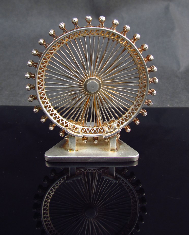 A silver model of the London Eye marked AD 925 Limited Edition 0002, 7cm tall,
