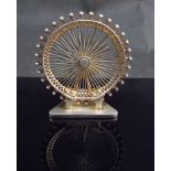 A silver model of the London Eye marked AD 925 Limited Edition 0002, 7cm tall,