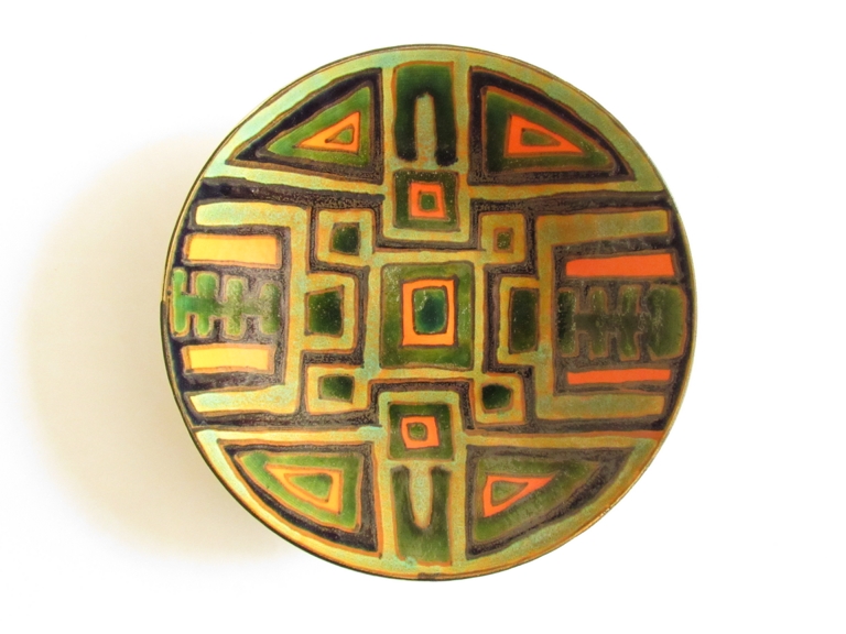 A Poole studio dish, green ground with abstract design in green, orange and black. Blue back stamp.