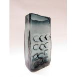 A Whitefriars Glass 'Nuts & Bolts' vase in indigo designed by Geoffrey Baxter.