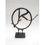 A contemporary bronzed sculpture corn ears in circle, mounted on a black marble base. Unmarked 34.